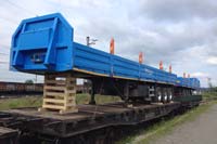 Доставка Бортовых полуприцепов «УралСпецТранс» на Южно-Сахалинск  железнодорожным транспортом